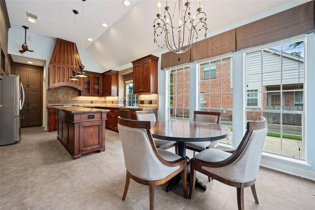 Another view of breakfast area and kitchn