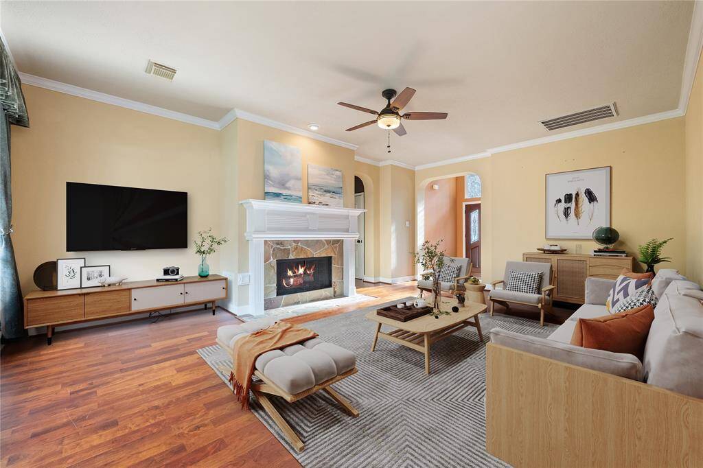 Bright and inviting family room has been virtually staged