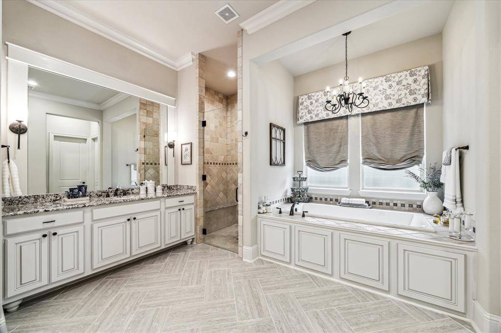 Unwind in the spa-like comfort of a deep jetted soaking tub or enjoy a refreshing rinse in the oversized walk-in shower. Either way, you’re sure to fall in love with the comfort and luxury of this private retreat.