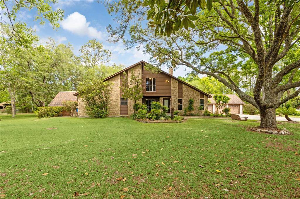 Discover your dream home at 97 El Dorado, Friendswood, TX 77546, nestled on a sprawling two-acre lot.