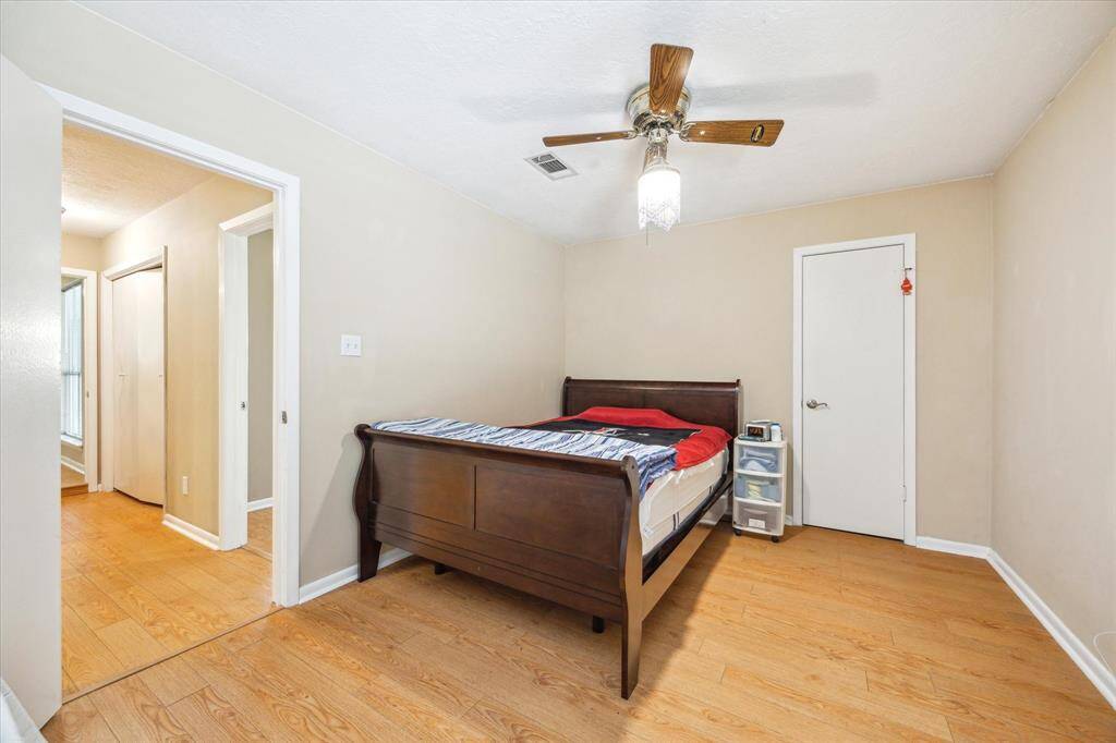Convenient downstairs bedroom with a spacious walk-in closet.