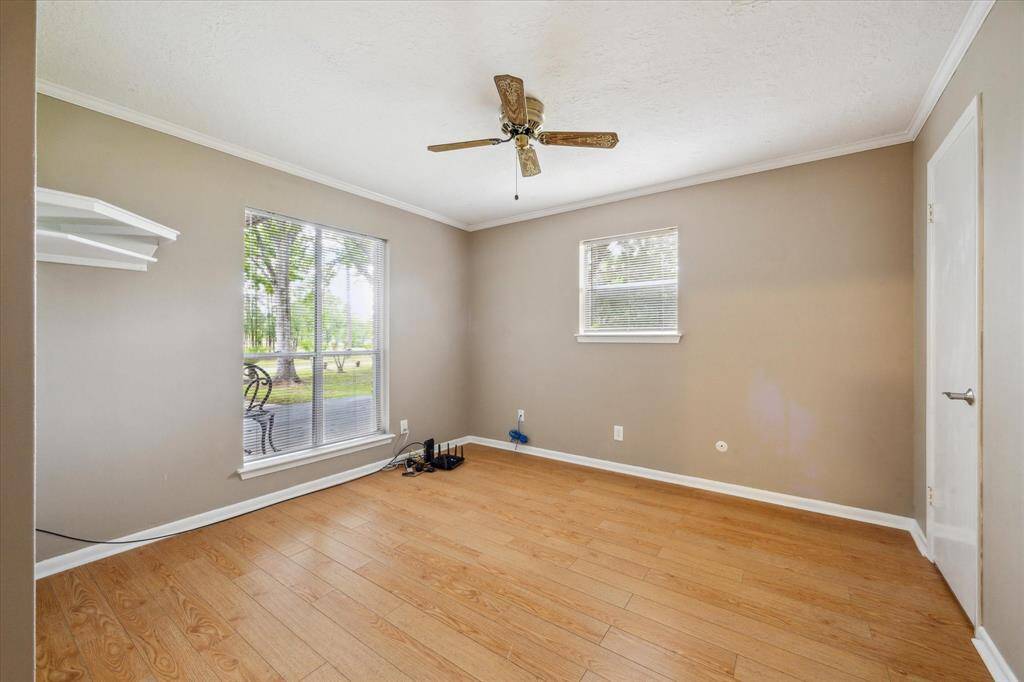 Cozy downstairs bedroom with a spacious walk-in closet.