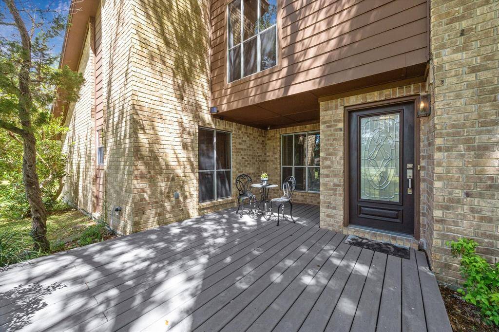 Charming front porch perfect for relaxing in your own oasis.