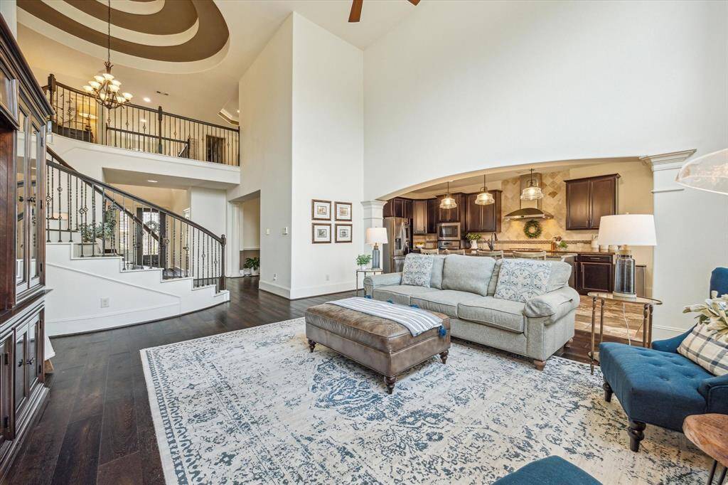 Imagine the sounds of laughter and chatter as you create lasting memories in this beautiful home. With soaring ceilings, abundant natural light, and plenty of space to relax and gather, it’s the perfect setting for life’s most cherished moments.