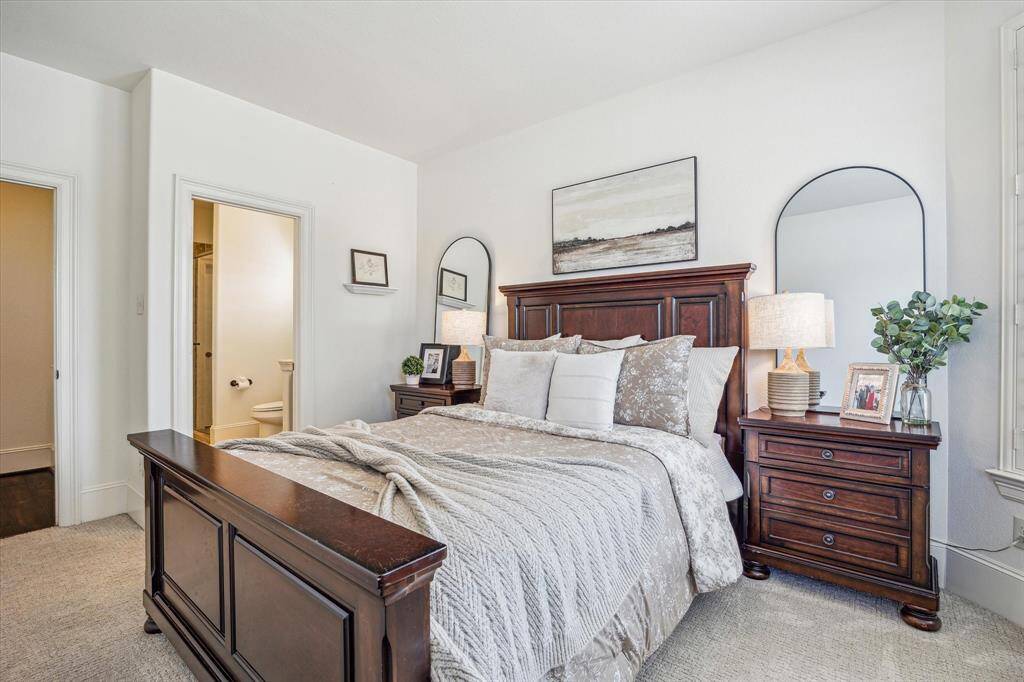 This smart floor plan features two suites on the first floor, including the luxurious owner’s retreat and this private guest suite. With three additional bedrooms and two full baths upstairs, you'll find plenty of space for family and guests.