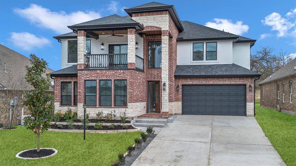 The home is equipped with modern energy-efficient features, including a never-ending hot water heater with a tankless water system and spray foam insulation throughout the home and garage, ensuring comfort and sustainability