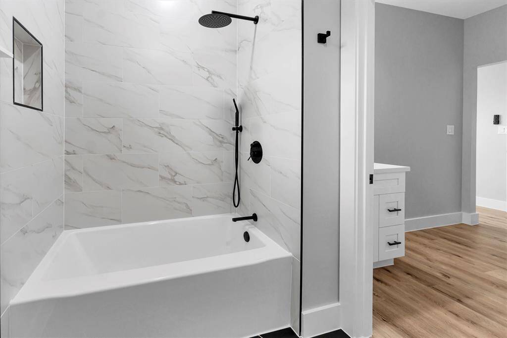 The home includes three bedrooms on the second two share a jack-in-jill bathroom, third bedroom has their own bathroom providing convenience and privacy for guests or family members