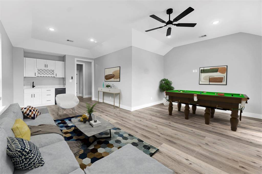 Flex space with views of Lake Conroe and balcony (virtually staged)