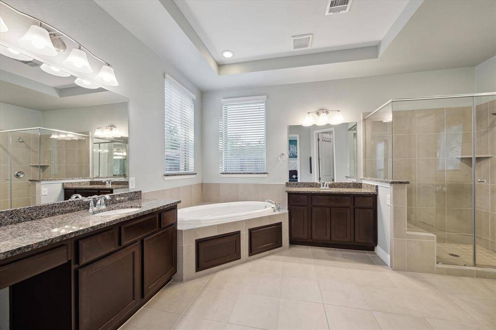 Primary Bath with Double Vanities, Soaking Tub, and Separate Shower