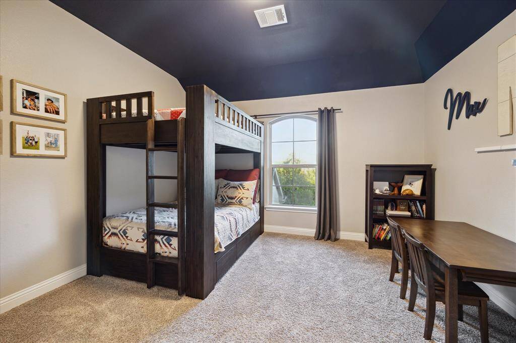 The Second Bedroom w/ Plush Carpet and Painted Ceiling Detail
