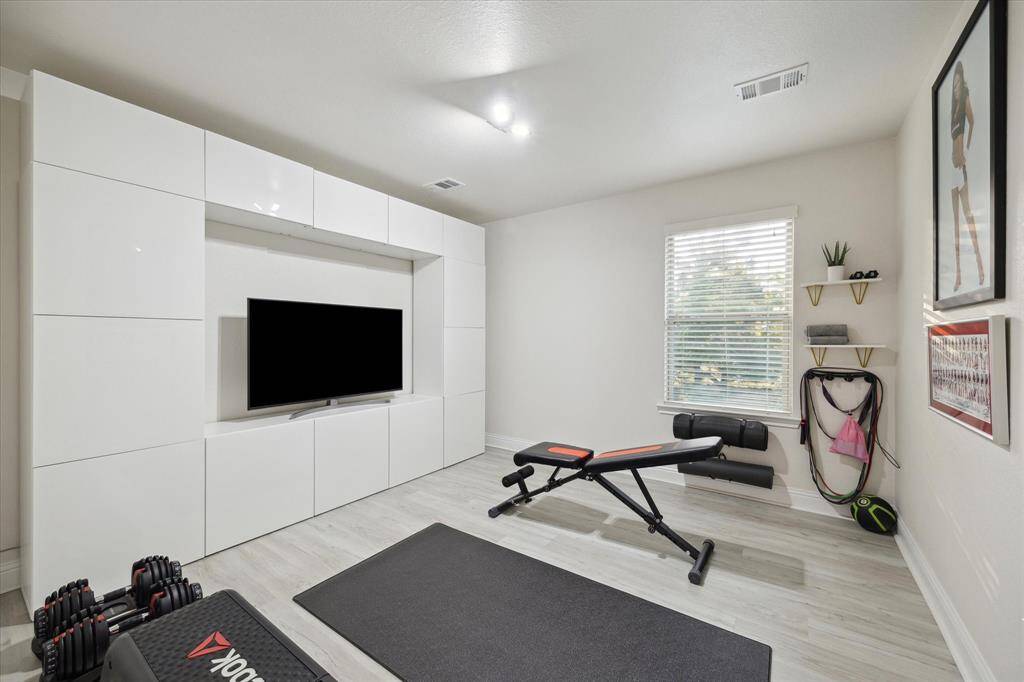 This Bonus Room w/ Upgraded Tile Floors Can Be Used as a 5th Bedroom, Home Gym or even a Second Office!