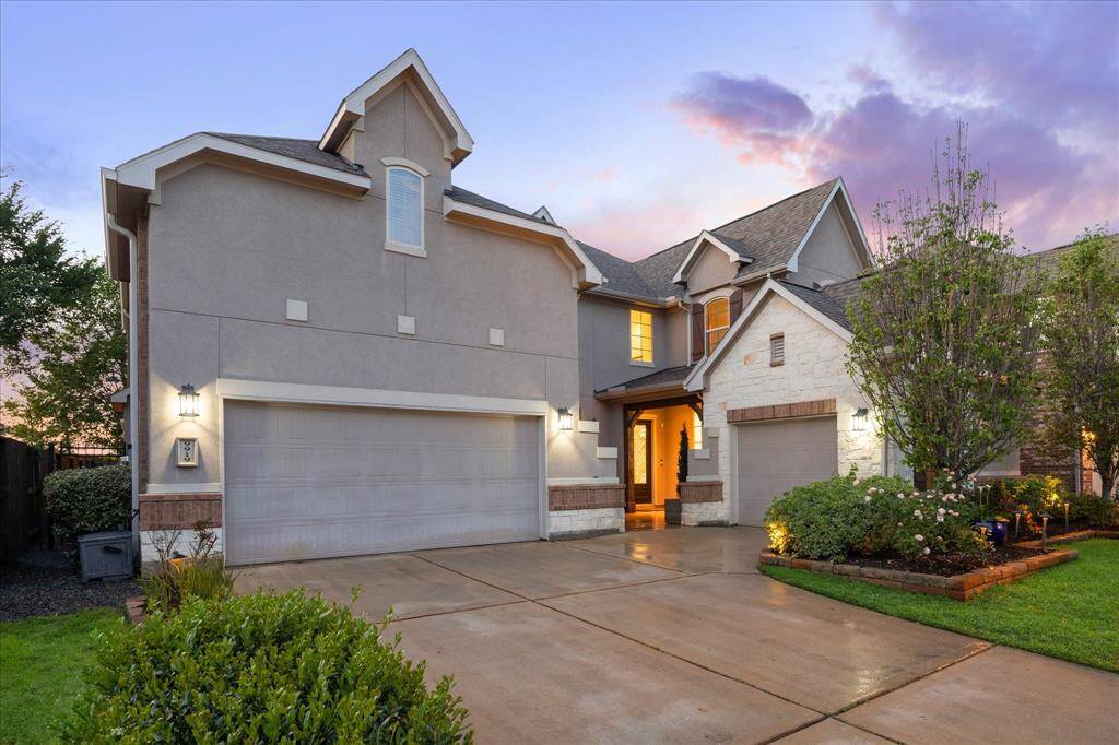 Full Brick, Stone and Stucco on this Beauty w/ a Double Wide Driveway, 3 Car Garage and Lots of Parking Space