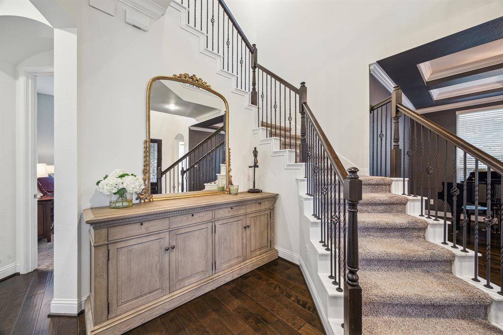 Grand Staircase with Wrought Iron Spindles
