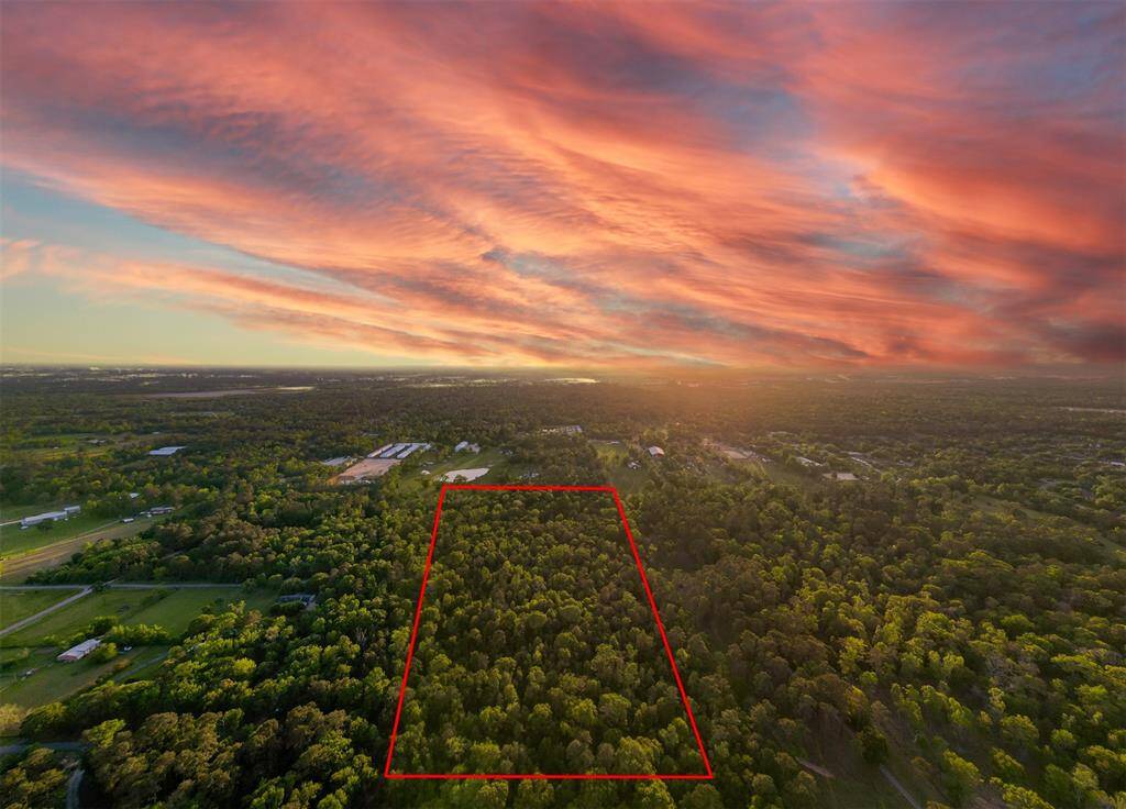 PERFECTLY LOCATED 23 (+/-) ACRE UNRESTRICTED PROPERTY! 12 Miles to The Woodlands & 15 Miles to Lake Conroe! Build multiple Homes or your Country Estate! OLD GROWTH TREES! ACCESS FROM 2 STREETS! Red boundry lines drawn for info purposes only. Buyer will need a new Survey.