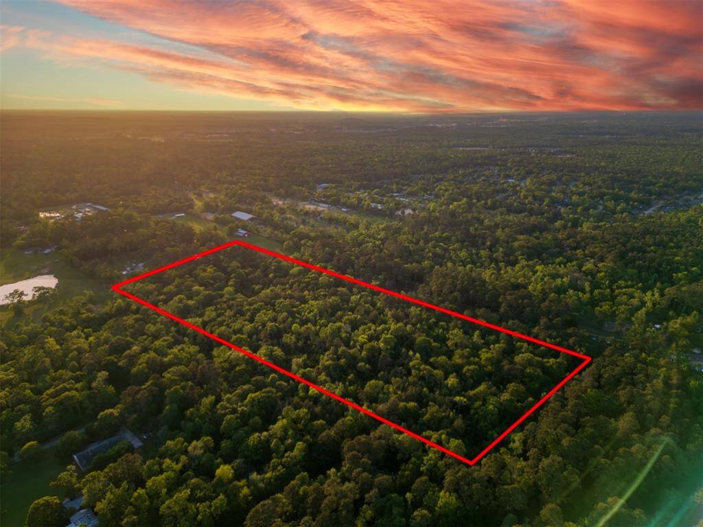 PERFECTLY LOCATED 23 (+/-) ACRE UNRESTRICTED PROPERTY! 12 Miles to The Woodlands & 15 Miles to Lake Conroe! Build multiple Homes or your Country Estate! OLD GROWTH TREES! ACCESS FROM 2 STREETS! Red boundry lines drawn for info purposes only. Buyer will need a new Survey.