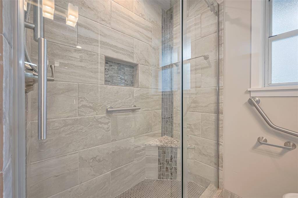 Lovely glass door shower.