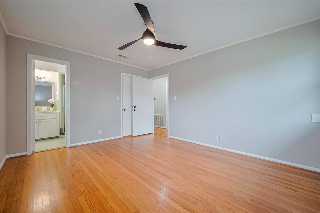 This bedroom has plenty of room for a king size bed should you so desire.