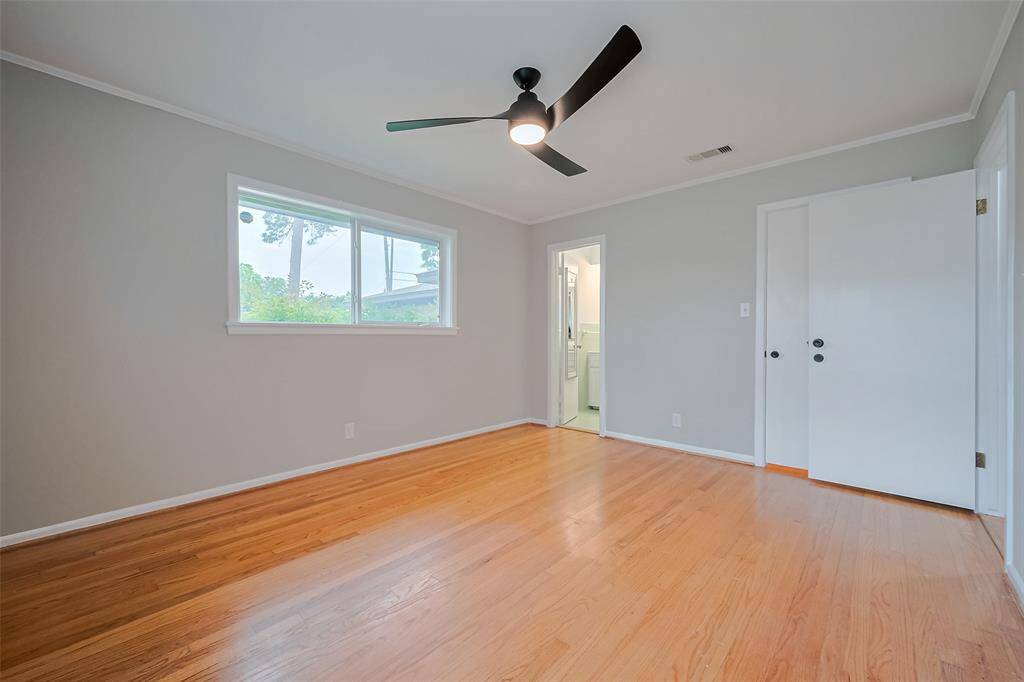 Another view of primary bedroom.