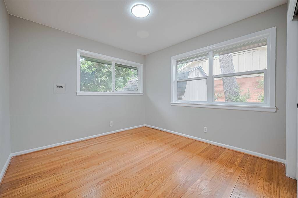 3rd bedroom with two windows.