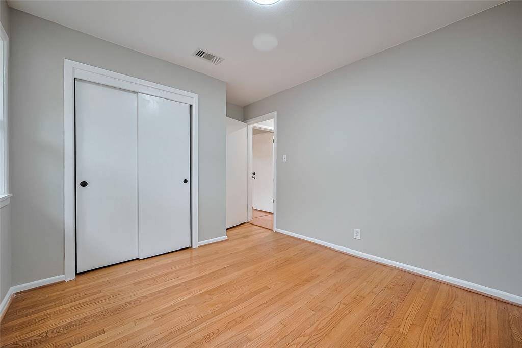 3rd bedroom has sliding door closet.