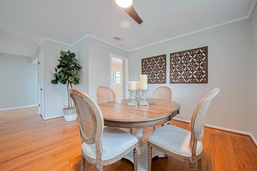 This open concept ranch style features a combo living and dining. Notice the access door to the kitchen and the hall to the foyer with a closet on the way.