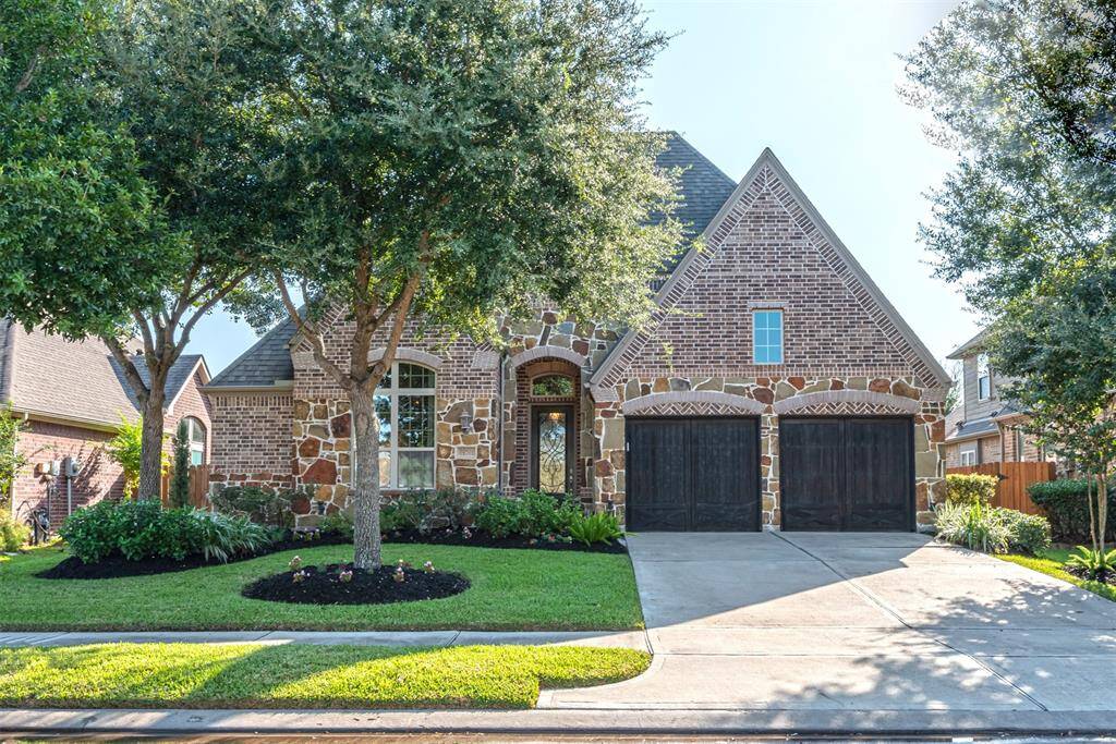 Stone elevation on this Highland Homes property in the heart of the Aliana Master Planned Community