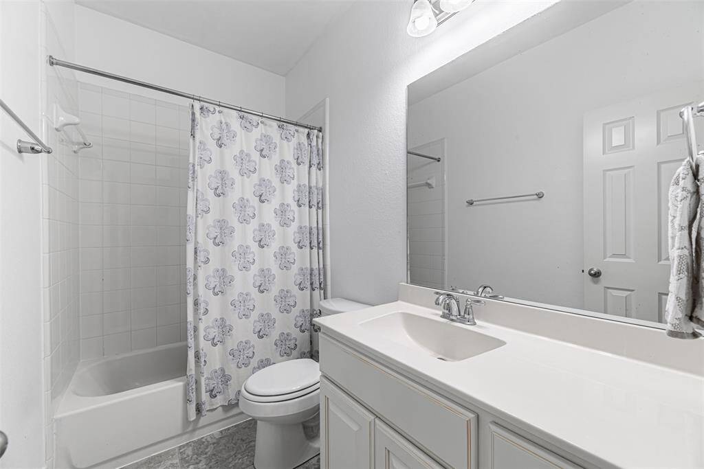 The second of there bathrooms with lots of counter space