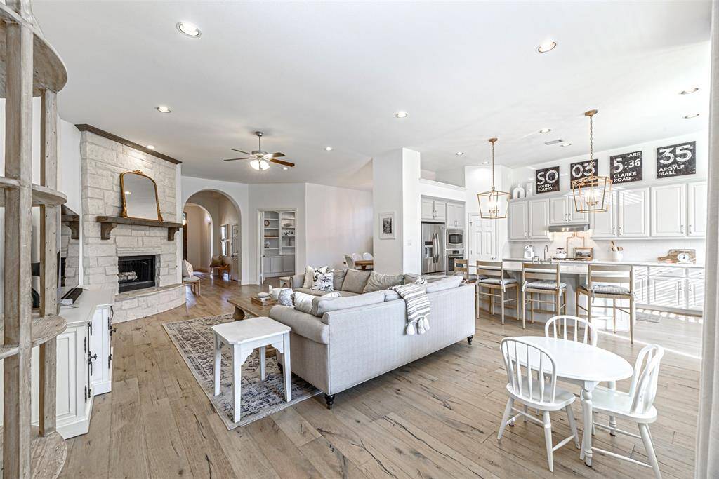Opposite wide view of the open concept family room with kitchen on the right