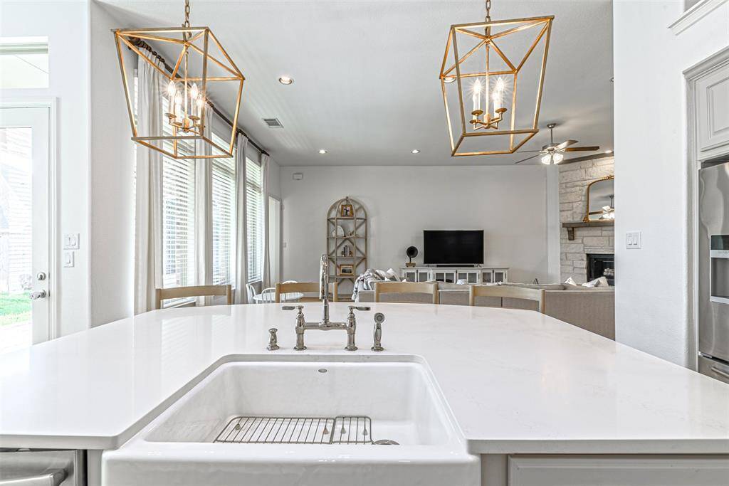 Large quartz countertop and deep farmhouse sink