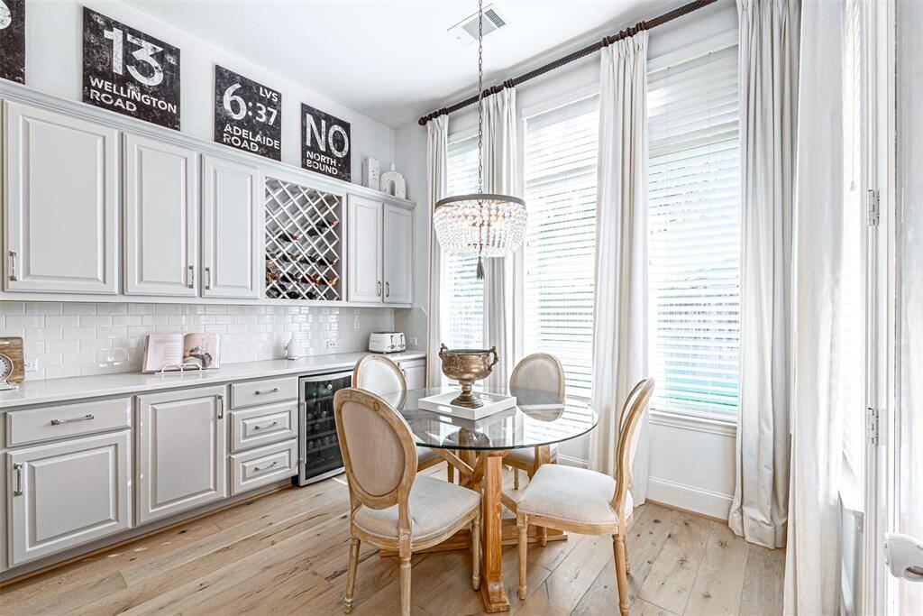 Serene breakfast nook with plenty of natural light, and an extended counter