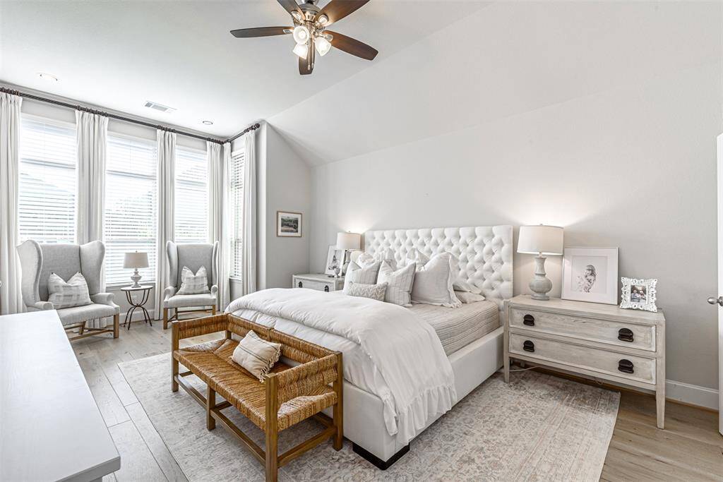 Extended primary bedroom with bay window and sitting area
