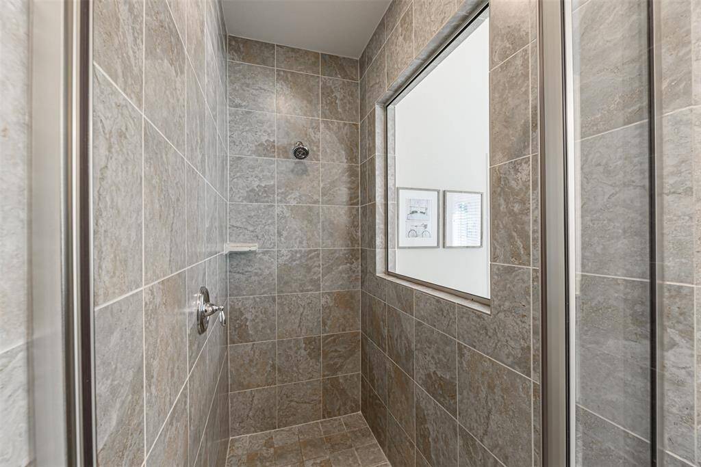 Stand up shower in the primary bathroom