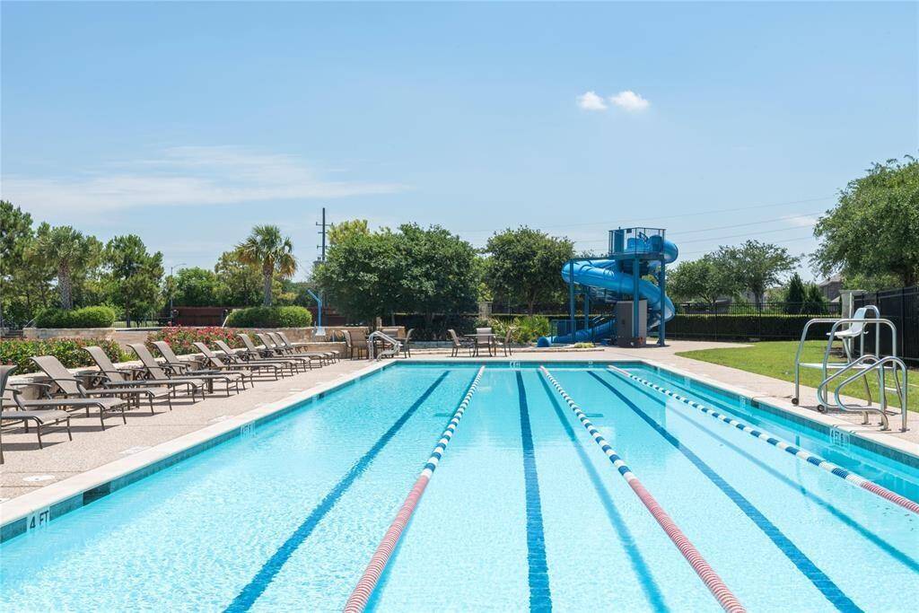 Private lap pool and water slide at the Club at Aliana