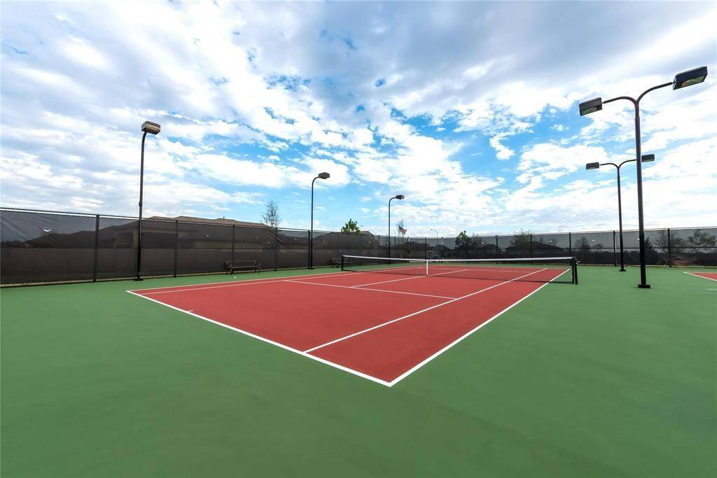 One of many private tennis courts in the master planned community