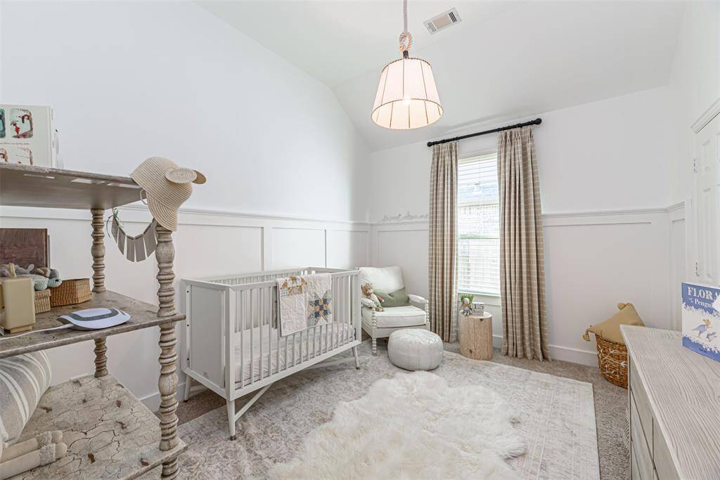 Third of four bedrooms, with custom woodwork