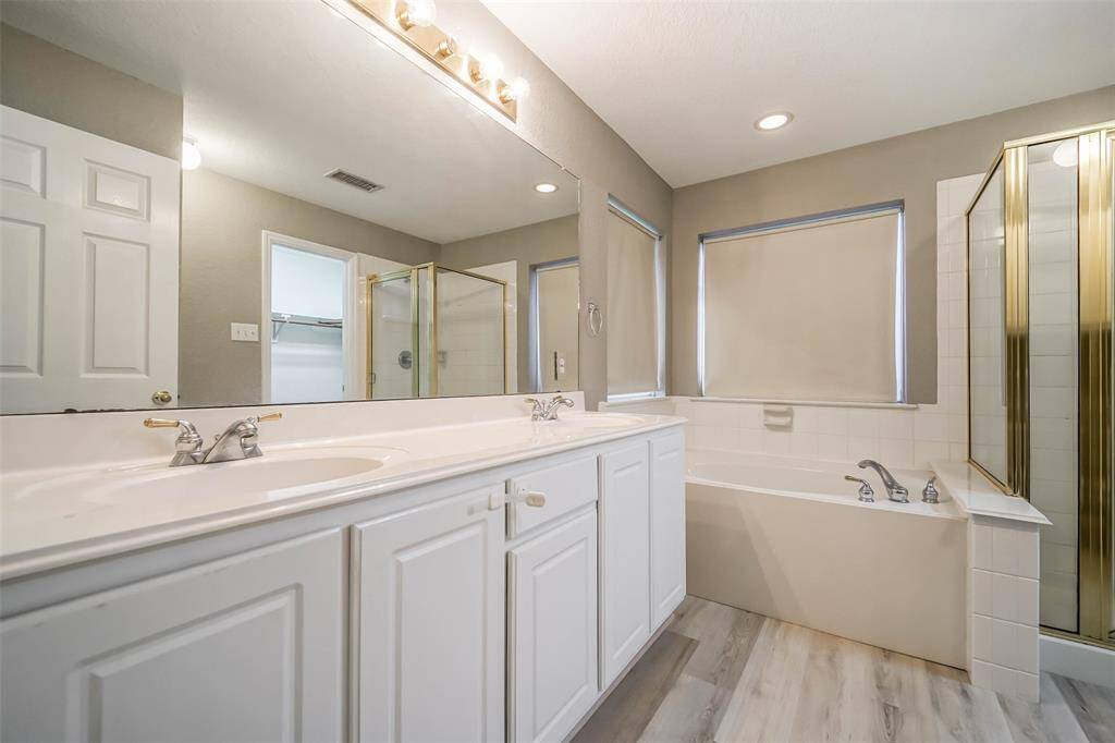 Master bathroom with double sinks. separate bath/shower
