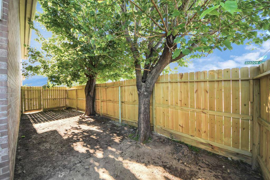 Private fenced in backyard