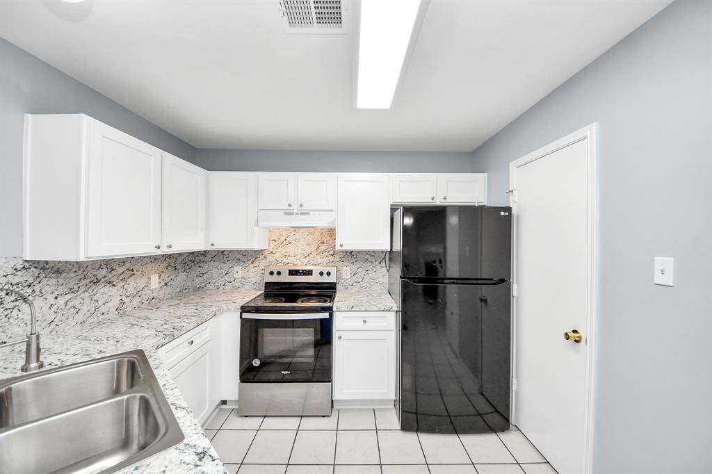 Spacious kitchen with refrigerator included