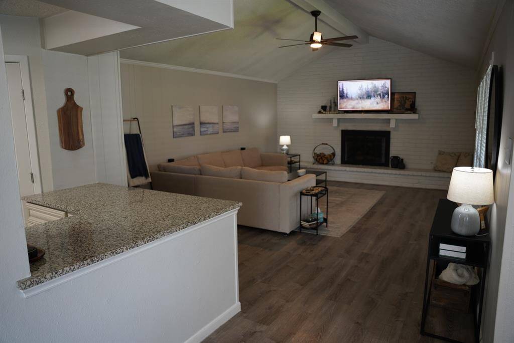 Kitchen Alternate View – Open layout with a breakfast bar, perfect for entertaining.