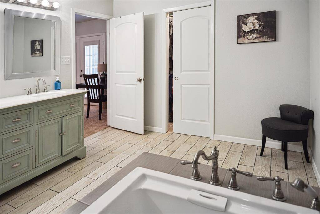 Bathroom Alternate View – Spacious layout with a soaking tub and stylish finishes.