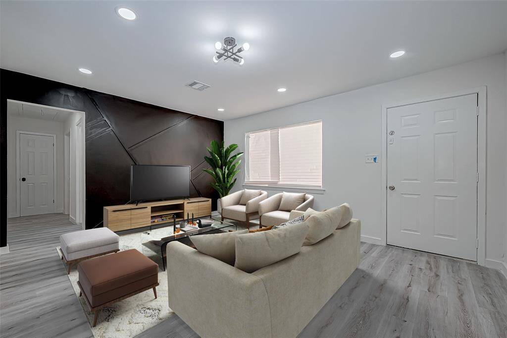 The virtually staged living room provides a dynamic and realistic visual of the space, helping you to easily envision how it could look with your own furnishings and style. By showcasing various layout possibilities and decor choices, the staging highlights the room’s potential, allowing you to see how your personal touches can bring it to life.