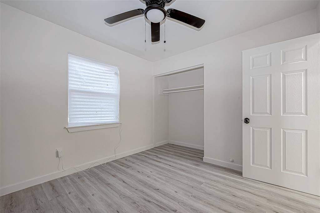 Ample natural light pours in through the window, making the space feel bright and airy.