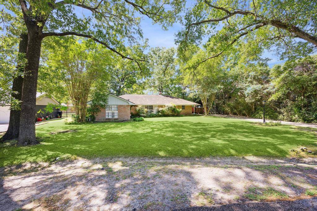Large lot located on the pretty curve in the street which makes it feel more private.