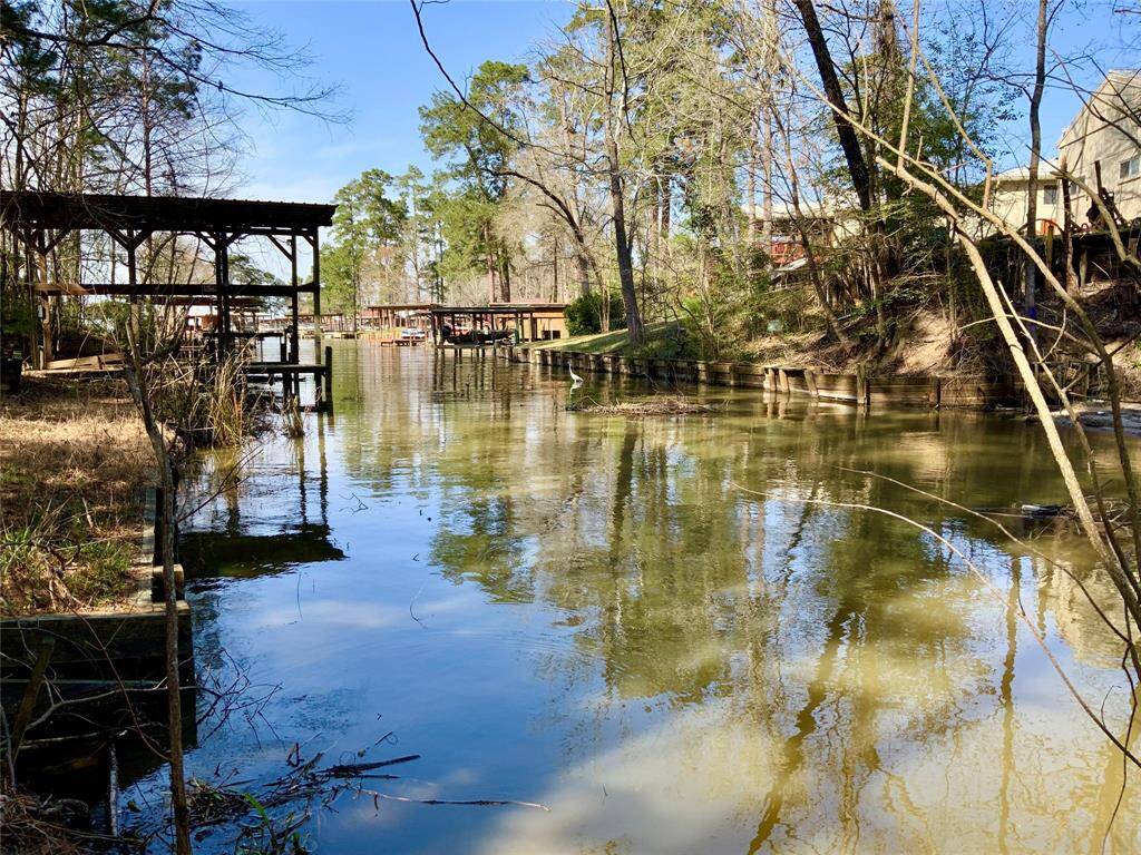 Canal approximately 25, across… 2-3’ deep and Seller has gotten fishing boat in and out!