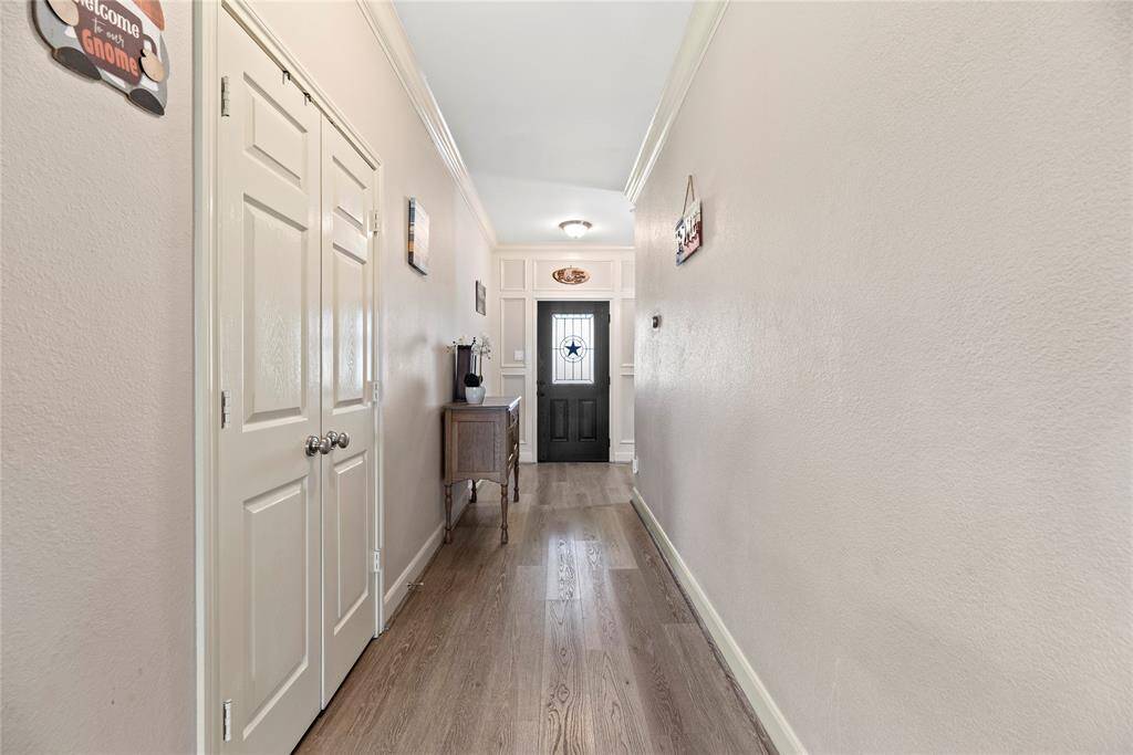 A view down the hallway. Closet on the left.