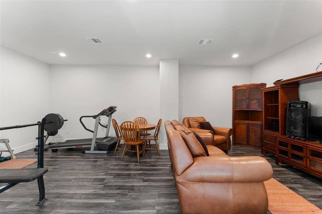 This spacious bonus room provides ample space for various activities, from working out to entertaining. Create the perfect space to fit your needs and enjoy the added functionality this room offers.