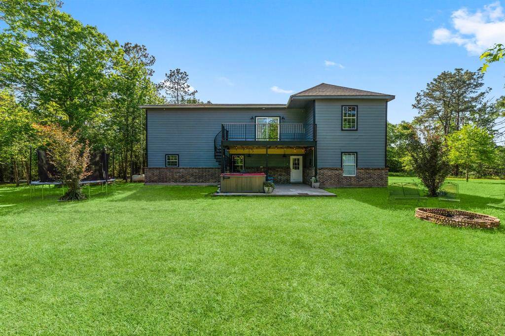 Enjoy the expansive backyard of this property, offering plenty of room for recreation and outdoor activities.