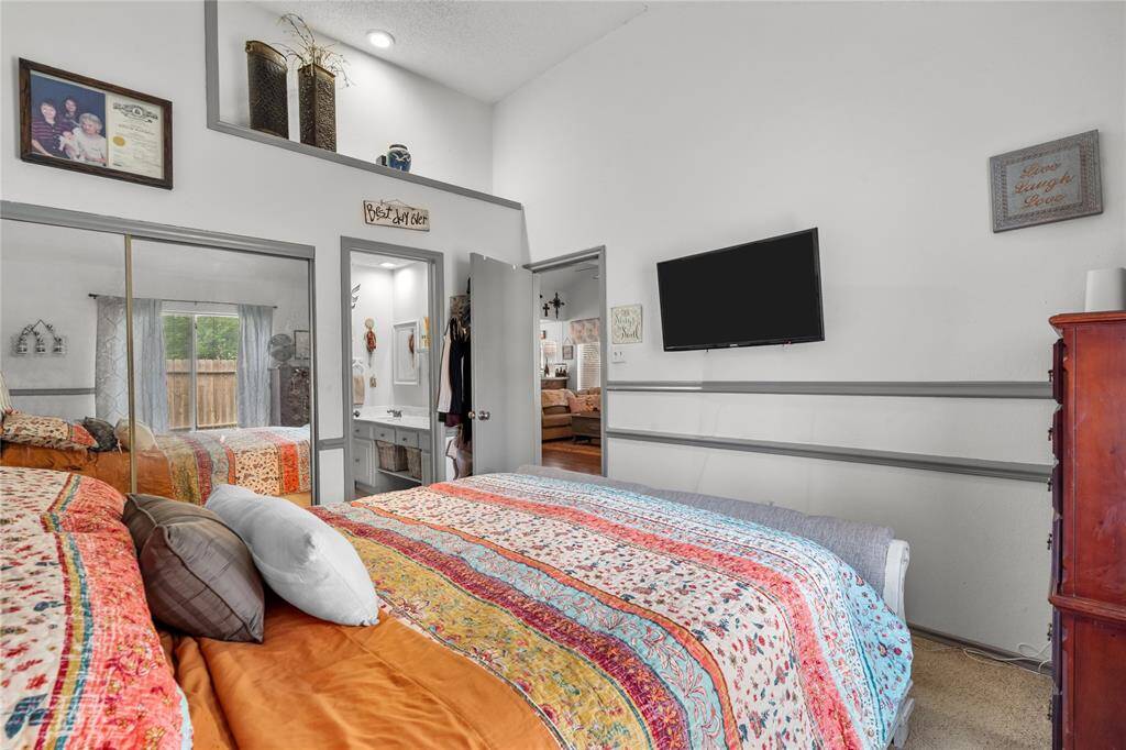 This inviting master bedroom features a California King bed with oversized frames, providing both comfort and style—yet there’s still plenty of space around it to move freely and create your perfect retreat.