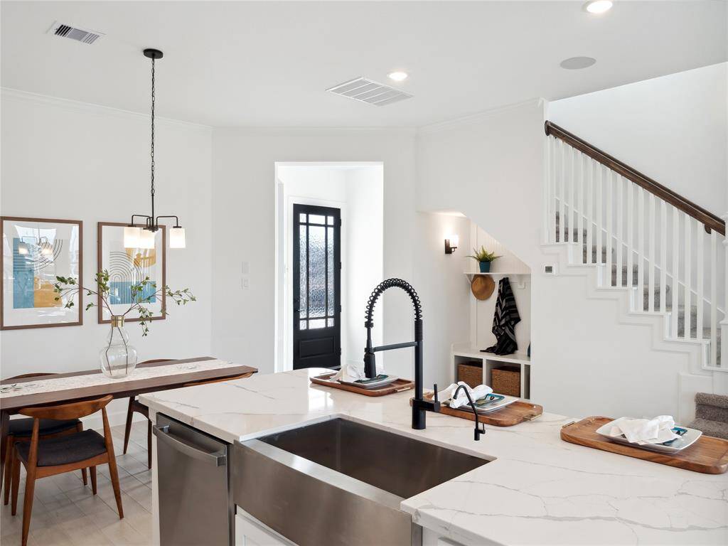 Island kitchen with charming dining areaThe Naples floor plan by K. Hovnanian Homes. 2nd Floor shown. *Prices, plans, dimensions, features, specifications, materials, and availability of homes or communities are subject to change without notice or obligation.