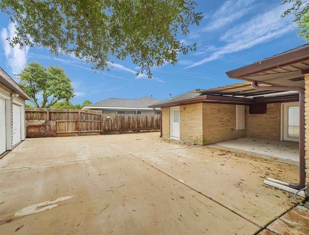 Plenty of parking space behind the gated driveway, and garage spaces.